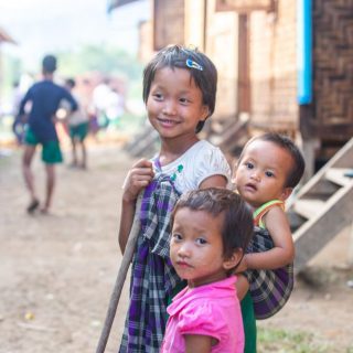 Children smiling siblings Myanmar