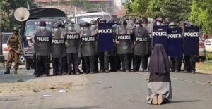 None kneeling in front of police Myanmar