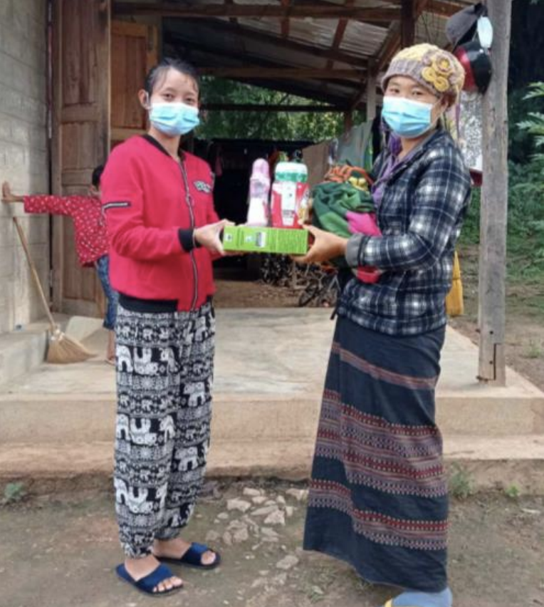 Two women with basic supply,Burma