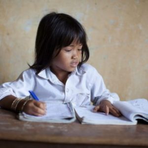 A little girl studying