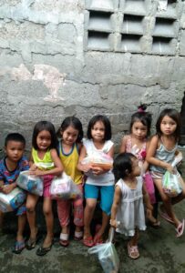 Pushing through despite the catastrophe; pictured: Filipino children