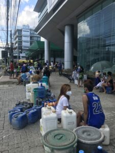 Filipinos queuing for drinking water after Typhoon Odette 