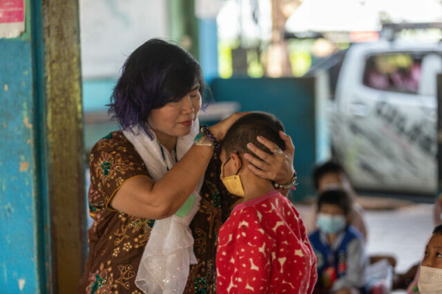 Kru Nam has reinvented herself as a mother to nearly 500 children rescued over the past 20 years.