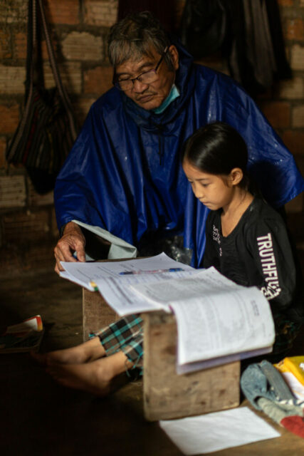 Mr. Tuan tirelessly visits the sponsored children in his village to encourage and assist them