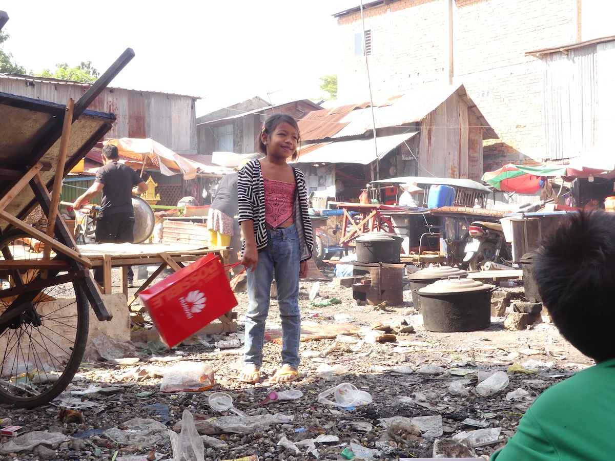 Girl working in slum